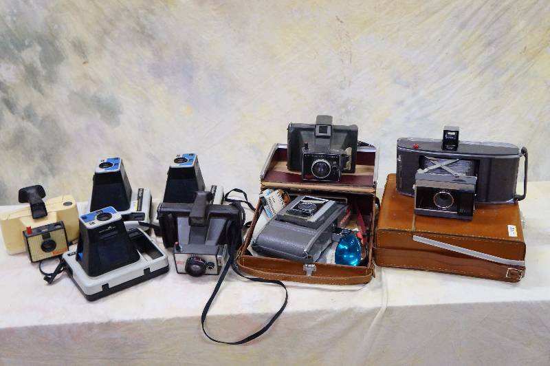 lot 90 image: Camera lot, instant polaroid & kodak, lot of two flats.