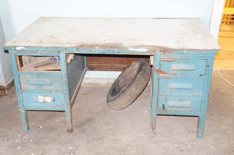 lot 103 image: Desk & spare tire.