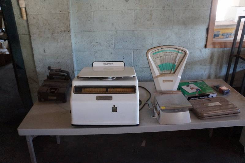lot 106 image: Misc table items & scales, dayton (scale ) three scales total.