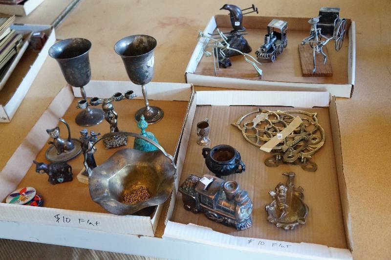 lot 114 image: Three flats of brass items & silver plate.