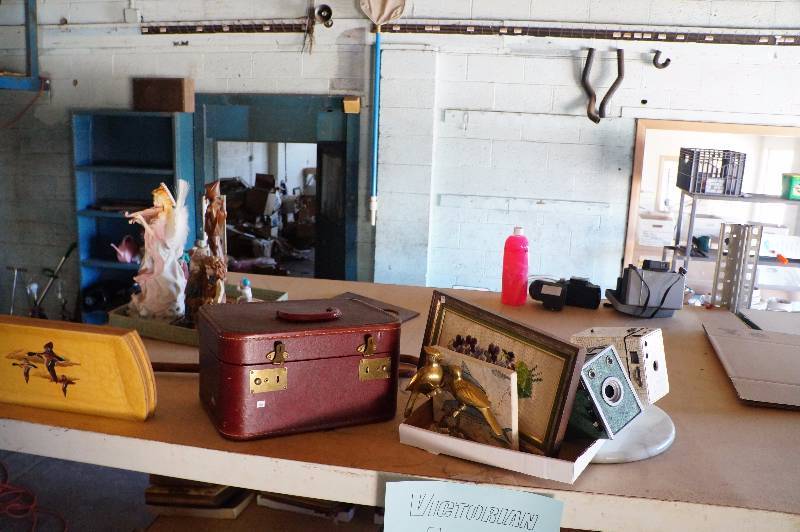 lot 120 image: Contents of top shelf, cameras, art, hasko trays.