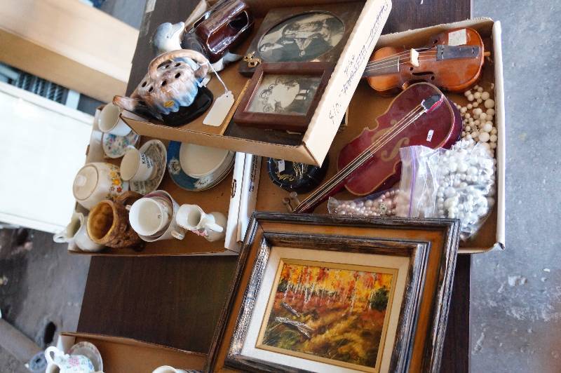 lot 124 image: 3 Flats, tea cups, jewelry, artwork, music box, misc.