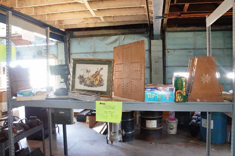 lot 134 image: Top shelf contents, an enlarger, vintage board games, artwork, & misc.