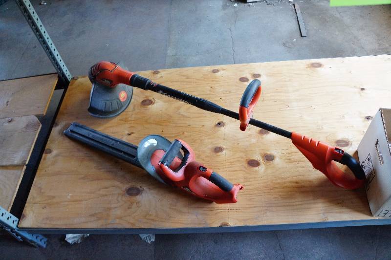 lot 136 image: Black & Decker weedeater & leaf blower, battery operated, but we have no batteries or charger.