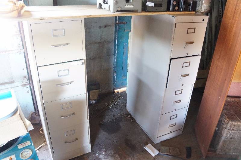 lot 140 image: 2 - 4 drawer tan filling cabinets.