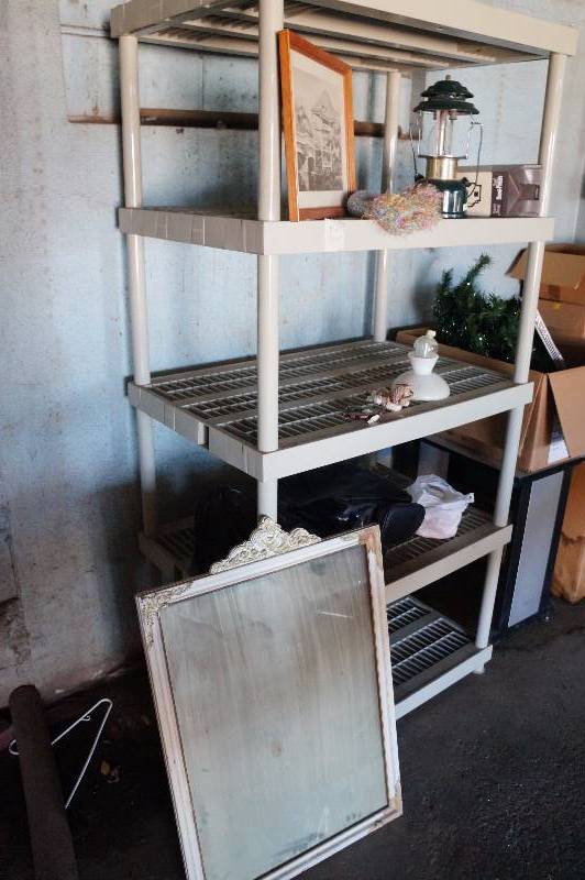 lot 147 image: Contents of one shelving unit, plus a table.