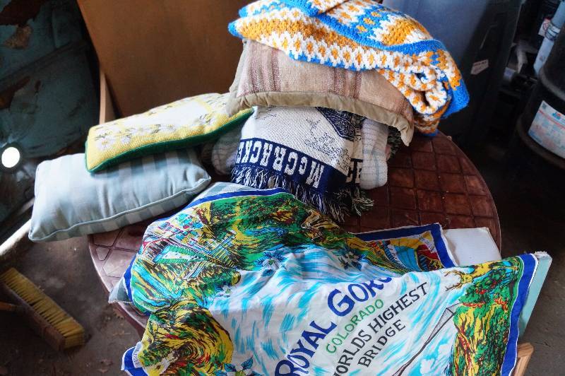 lot 165 image: Plastic table wpillows & sheets.