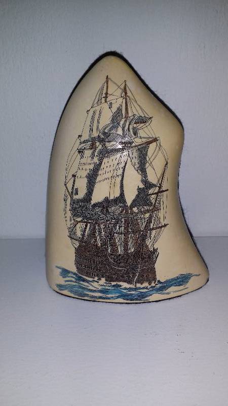 lot 1132 image: Scrimshaw Replica() Carved Whale ToothBone, Colored, Felt-Backed