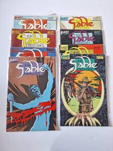 lot 415 image: (8) Jon Sable Freelance Comics - Nos (14  19  20  35  30  29  34  37)