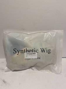 lot 96 image: Wig and hair extensions