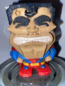 lot 123 image: Little Wooden Superman
