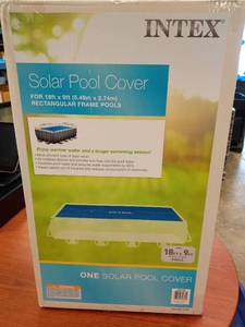 lot 1019 image: INTEX 28016E Solar Pool Cover For 18ft Rectangular Frame Pools Insulates Pool Water Reduces Water Evaporation Keeps Debris Out Reduces Chemical Consumption Retail $62.89