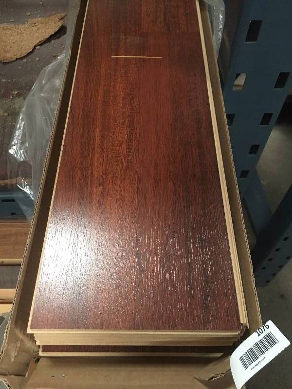 lot 1076 image: 5 boxes85 sq ft of 8MM Everglade Mahogany Laminate