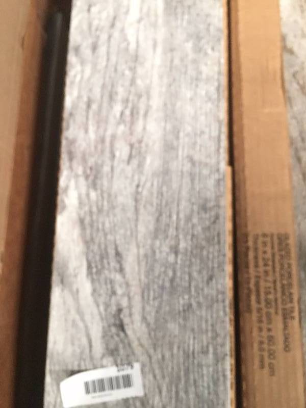 lot 1079 image: 6 boxes87 sq ft of 12x24 Wood Look Tile