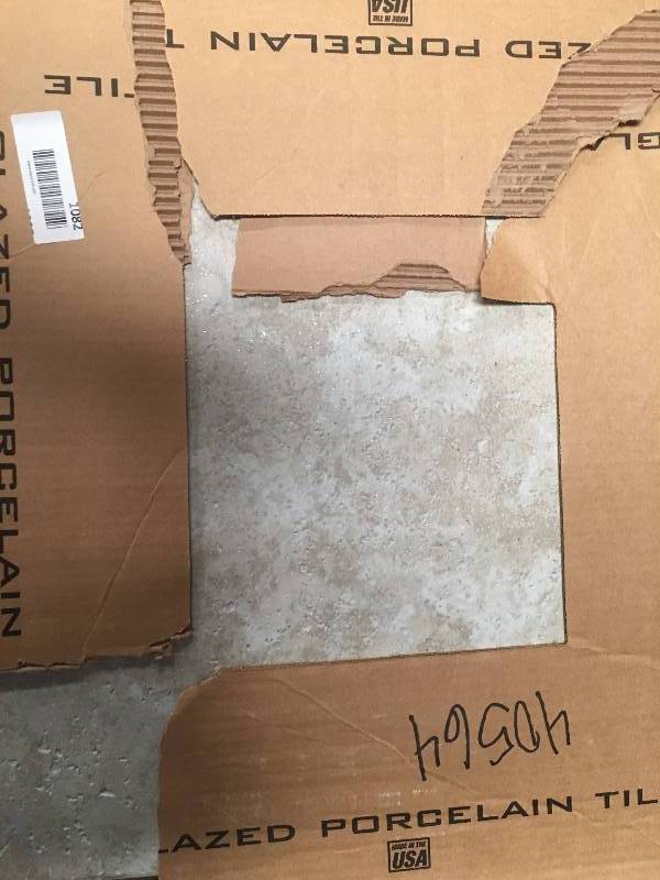 lot 1082 image: 4 boxes64 sq ft of 20x20 Ivory Porcelain Floor Tile