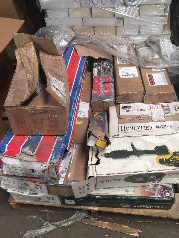 lot 1095 image: Pallet of Customer Returns - Shocks, miter saw stand, humidifier, etc.