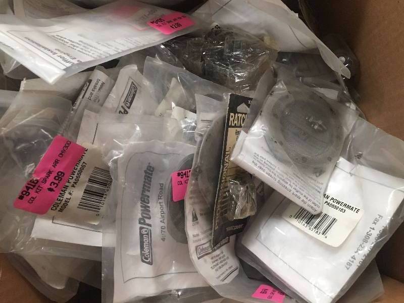 lot 1129 image: Mixed box of ratchet repair kits and various spark arresters
