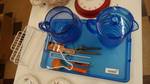 Blue tray & pitchers, kitchen tools, shower caddy.