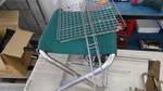 Camp Stool, Wire cooker rack, Electric Rotisserie, Fishing Pole.