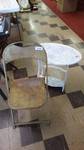Vintage metal folding chair & white oval side table/magazine rack.