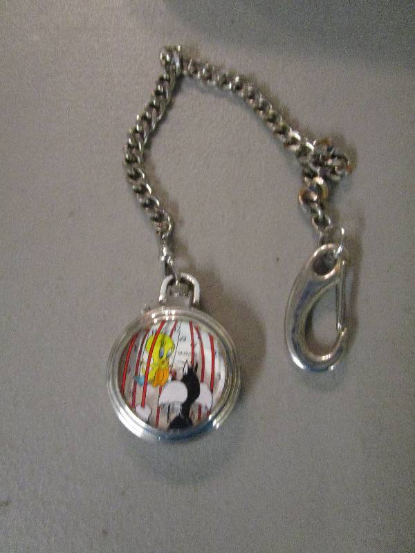 lot 622 image: Warner Bros Pocket Watch no battery