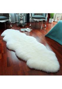 lot 15619 image: LLB Genuine Sheepskin Area Rug, Ivory White, 2 x 6, Retail 89.00, (Stains On Backside)