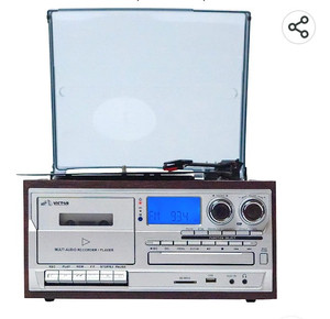 lot 15684 image: Musitrend 8-in-1 Turntable Music Center with 3-Speed Record Player, CDMP3Cassette Player, AMFM Radio, Dual Bluetooth in & Out, USB Playback & Record, & Built-in Stereo Speakers, Espresso