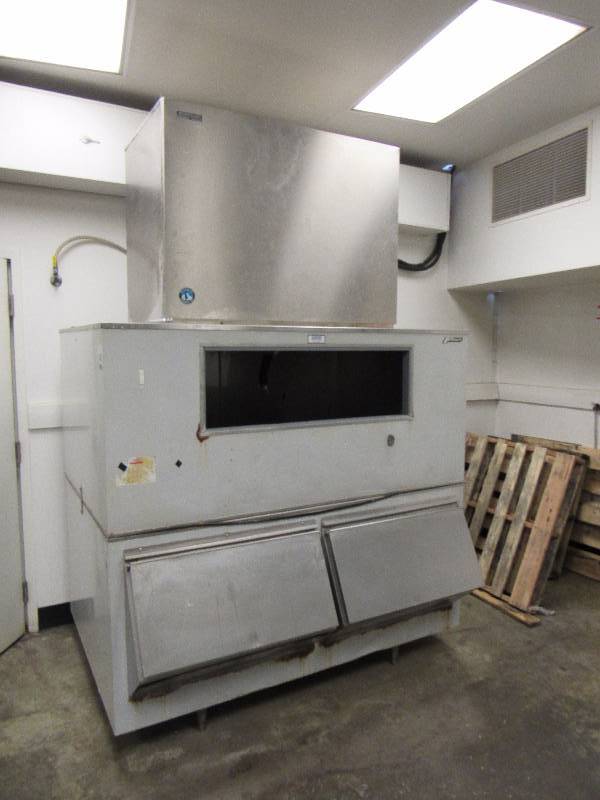lot 1538 image: Hoshizaki 2000Lb Ice Maker On Follet Bin