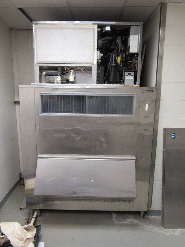 lot 1568 image: Hoshizaki 2000Lb Ice Maker On Follet Bin