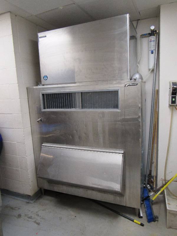lot 1578 image: Hoshizaki 2000Lb Ice Maker On Follet Bin