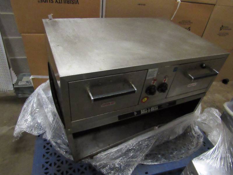 lot 1727 image: JJ Connolly Roll-A-Grill On Stand With Casters