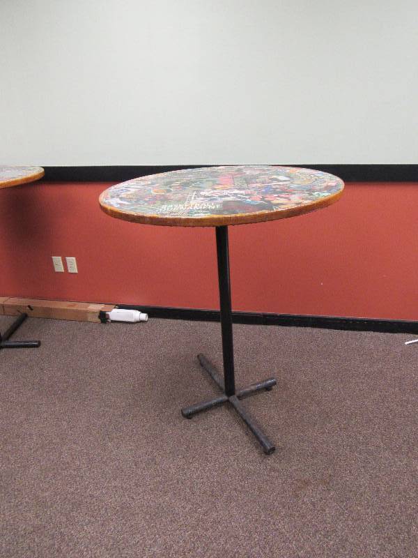 lot 1796 image: 36 Round Bar Height Table With Kansas City Entertainment Collage On Top