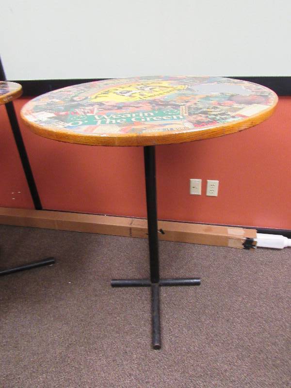 lot 1797 image: 36 Round Bar Height Table With Kansas City Entertainment Collage On Top