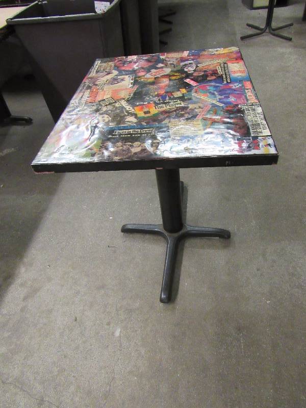 lot 1799 image: 30 X 24 Standard Height Table With Kansas City Entertainment Collage On Top