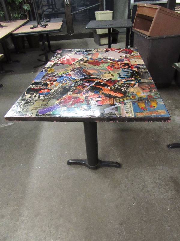 lot 1803 image: 36 X 53 Table With Kansas City Entertainment Collage On Top