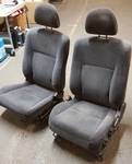 Nice pair of Acura? Gray velour bucket seats with drivers side lumbar adjusting and full reclining on both.