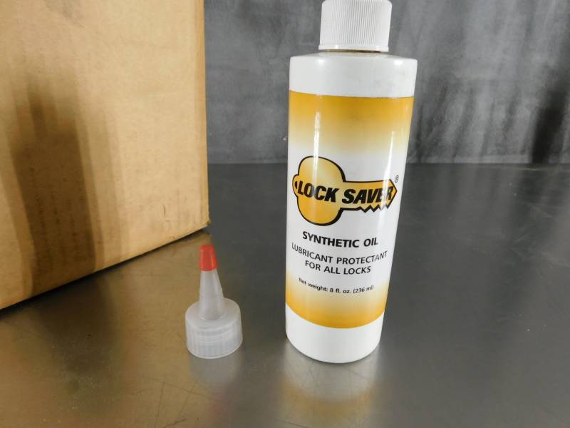 lot 1233 image: Lot of Lock Saver Synthetic Oil For Locks