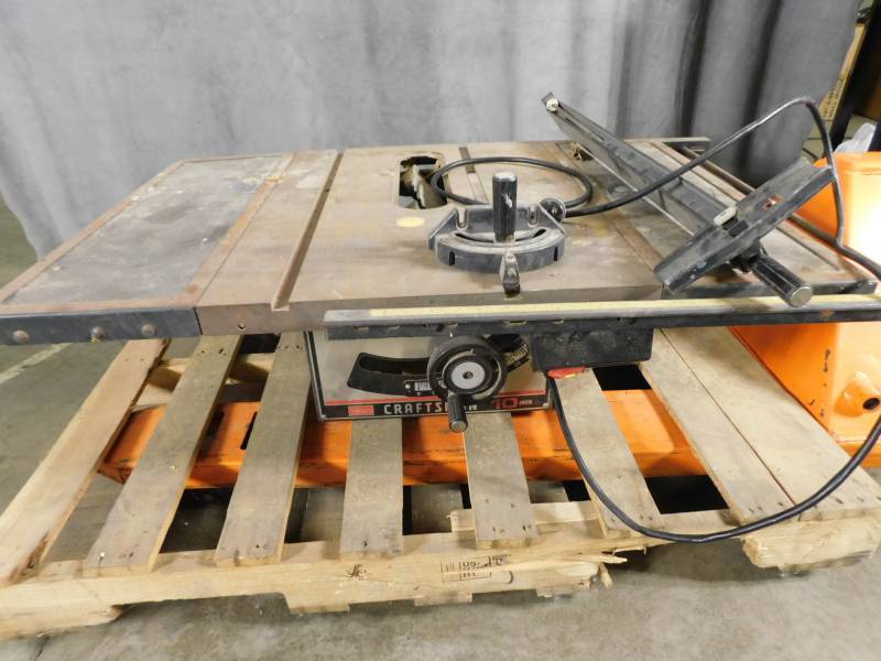 lot 1008 image: Sears Craftsman 10 Table Saw plugged in comes on