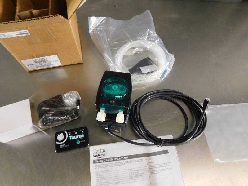 lot 1242 image: Taurus CP-300 Programable Laundry Dispenser