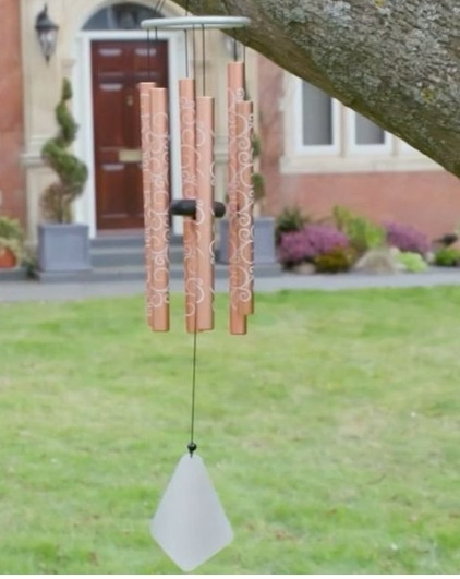 lot 410011 image: MARIGOLD 36 SIX BELL HAND TUNED WIND CHIMES WITH SCROLL DESIGN COLORS MAY VARY