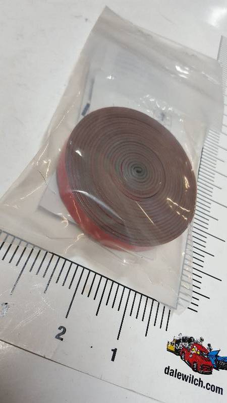 lot 7067 image: Whats left of a 3M double sided adhesive tape roll
