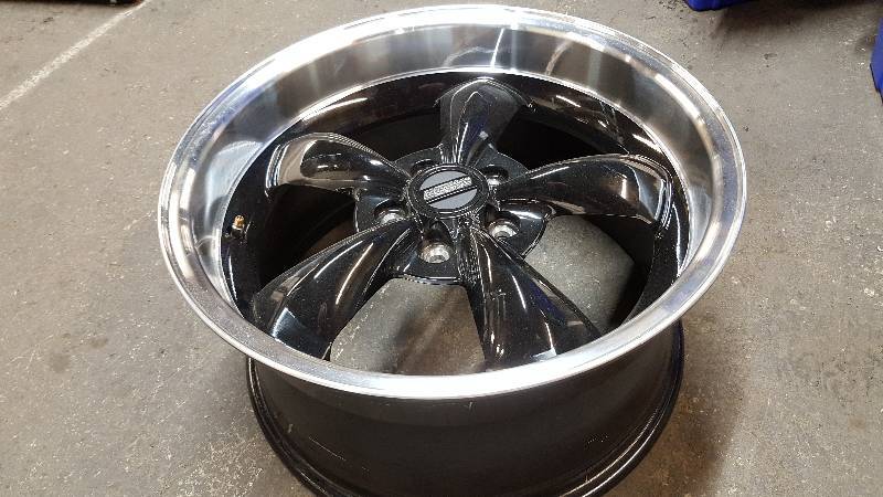 lot 7072 image: This American Muscle wheel was used on a wild display and now it needs to be used as a Coffee table in your man cave or garage.