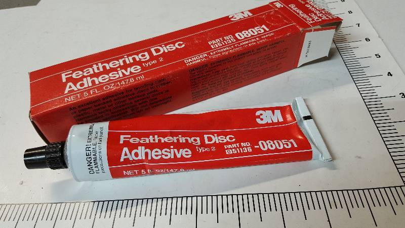 lot 7077 image: New and in the box is this tube of 3M feathering disc adhesive