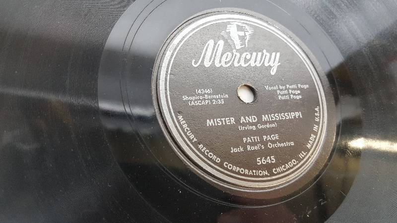 lot 7331 image: Before the 50s came these 78 RPM vinyl records.  Going to sell these one at a time.  Look at the photos for the artist.