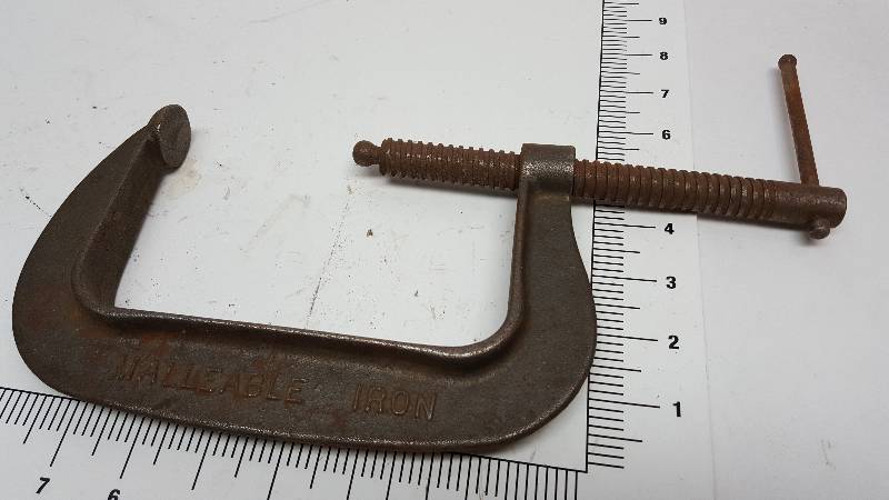 lot 6968 image: Handy to just have in the shop or tool box is a C Clamp.  The lay out template will show you the size