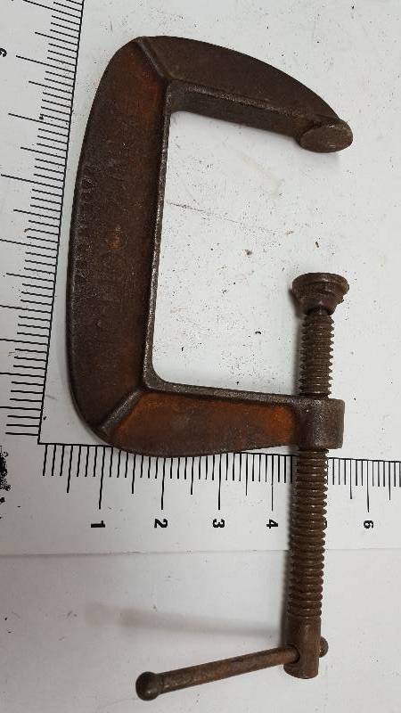 lot 6976 image: Handy to just have in the shop or tool box is a C Clamp. The lay out template will show you the size
