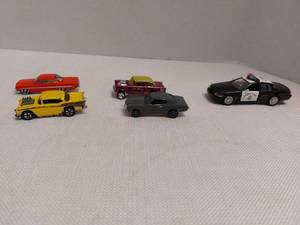 lot 39419 image: A Ford Running Down 4 Chevy Vehicles