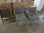 Pair Of Cloth Padded Metal Framed Chairs