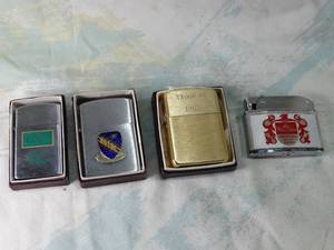 lot 30520 image: 4 Collectible Lighters