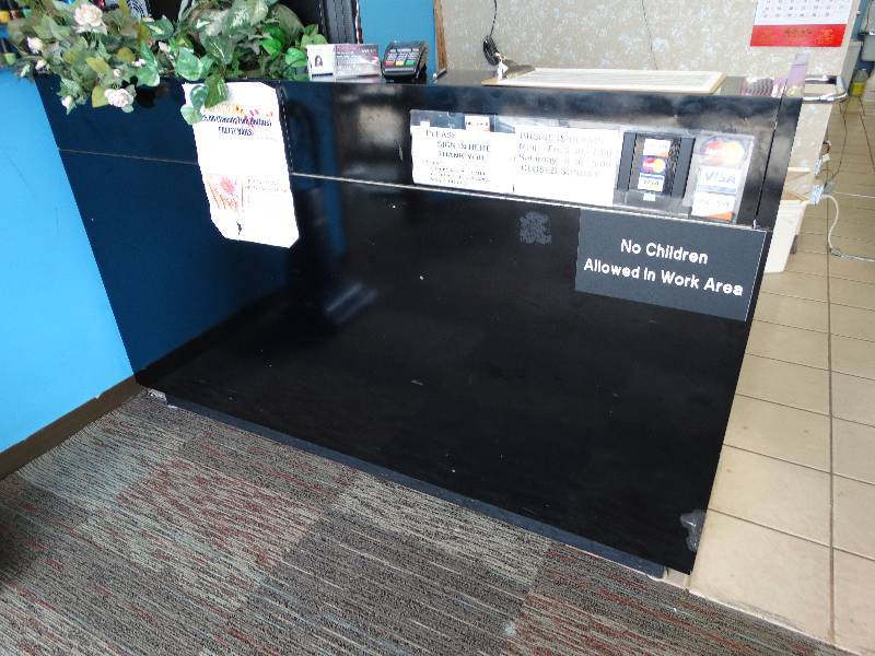 lot 609 image: Custom cash counter.